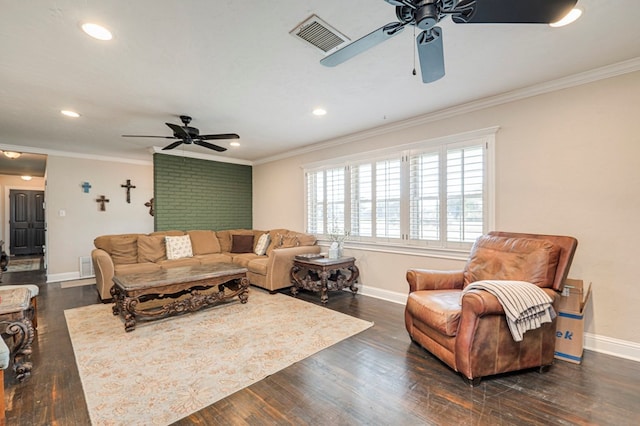 living room with dark hardwood / wood-style floors and ornamental molding