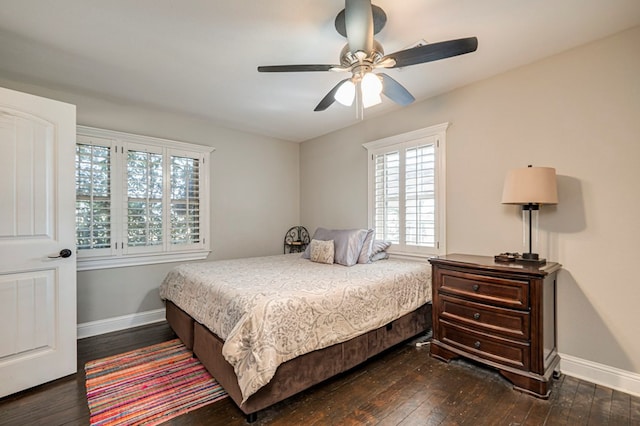 bedroom featuring ceiling fan and dark wood-type flooring