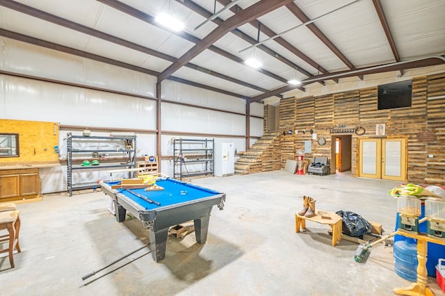 rec room featuring beam ceiling, high vaulted ceiling, concrete floors, and pool table