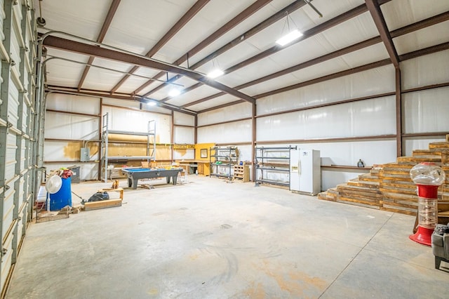 garage with white fridge with ice dispenser