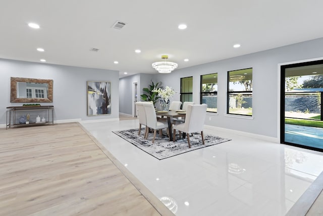 2208 Bedford Dr, Midland, TX 79701 - dining space featuring recessed lighting, visible vents, baseboards, and an inviting chandelier