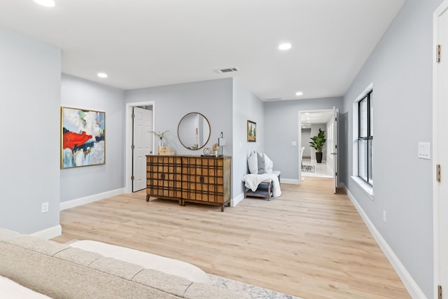 2208 Bedford Dr, Midland, TX 79701 - living area featuring recessed lighting, baseboards, visible vents, and light wood finished floors