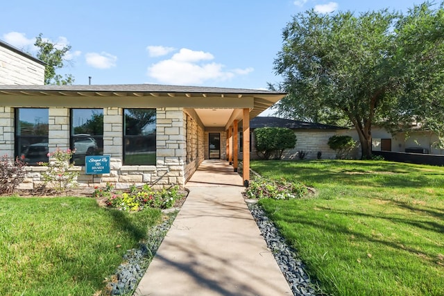 2208 Bedford Dr, Midland, TX 79701 - view of front facade featuring stone siding, a chimney, and a front lawn