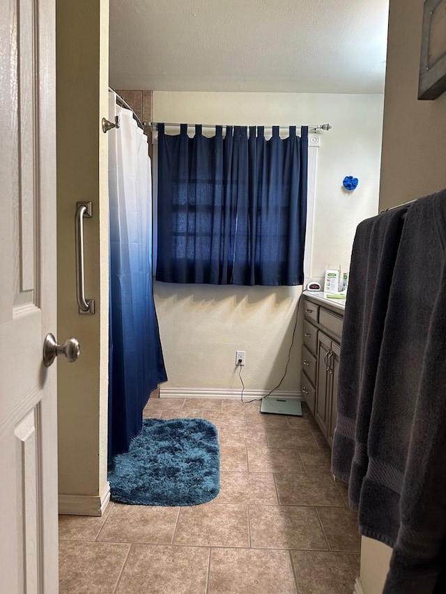 bathroom with vanity and a shower with curtain