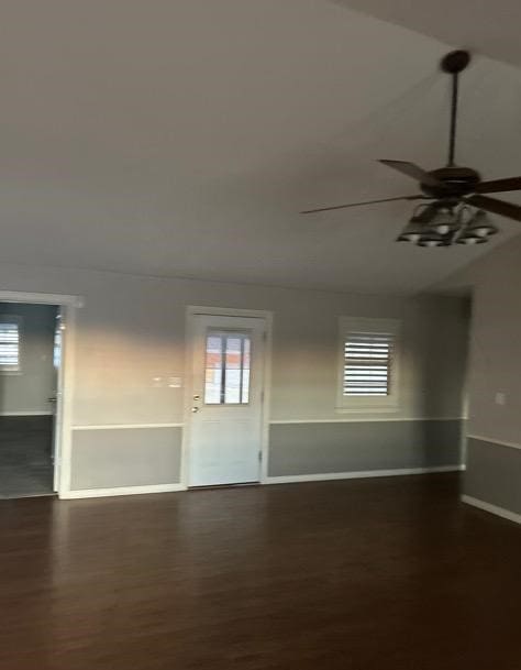 spare room with dark hardwood / wood-style flooring