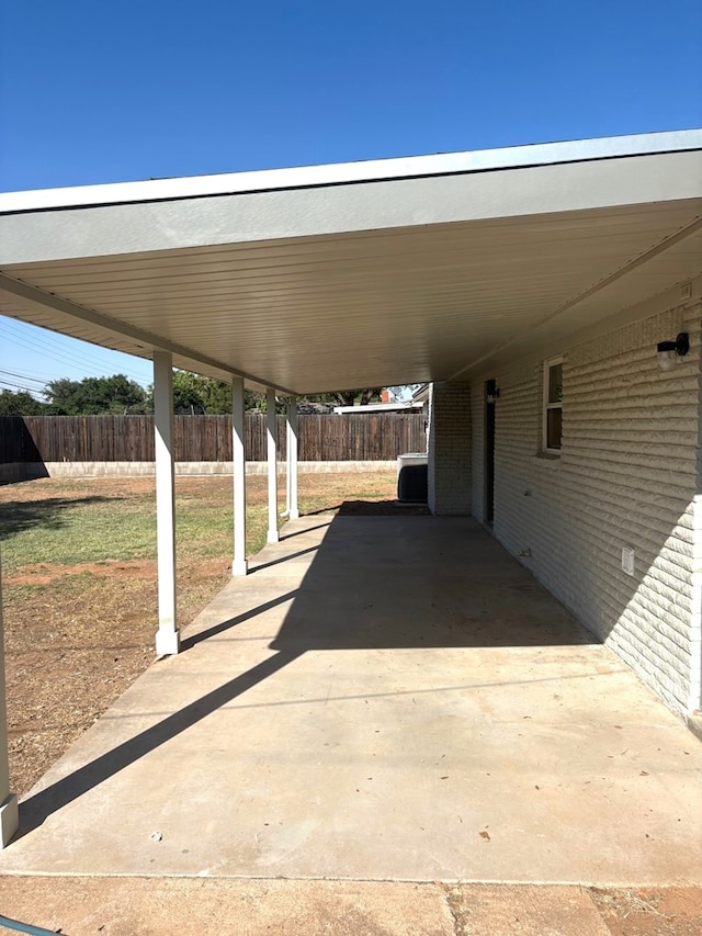 2612 Cimmaron Ave, Midland, TX 79705 - view of patio with a carport