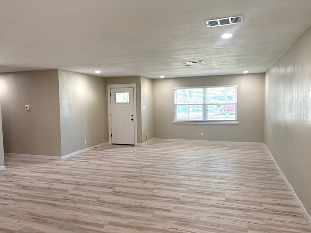2612 Cimmaron Ave, Midland, TX 79705 - entryway featuring light wood-type flooring and recessed lighting