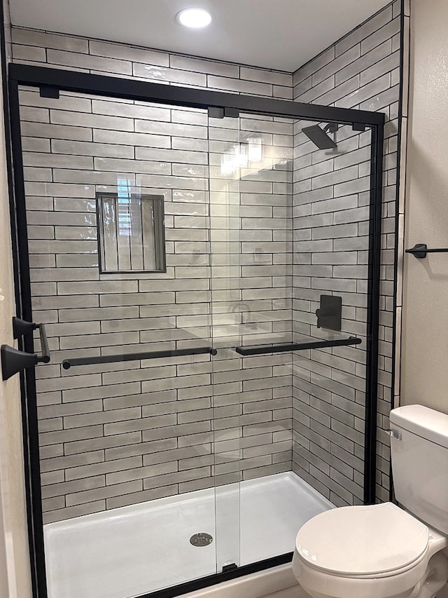 2612 Cimmaron Ave, Midland, TX 79705 - bathroom with toilet and a stall shower
