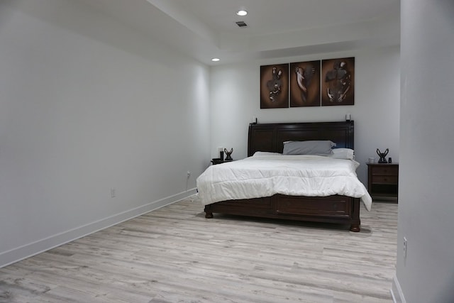 bedroom featuring light wood-type flooring