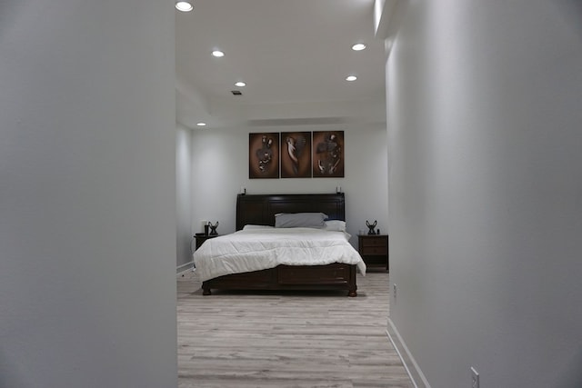 bedroom featuring light hardwood / wood-style floors