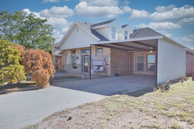 view of front facade with a carport