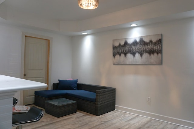 living area with light hardwood / wood-style flooring