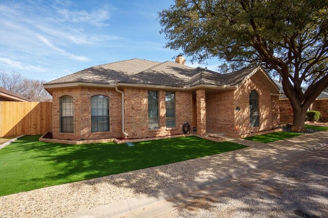 4902 Foxboro Ct, Midland, TX 79705 - ranch-style home featuring brick siding, a chimney, and a shingled roof