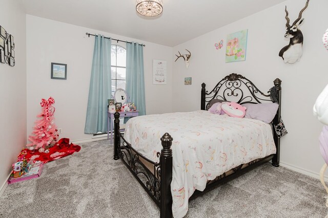 4902 Foxboro Ct, Midland, TX 79705 - carpeted bedroom featuring baseboards