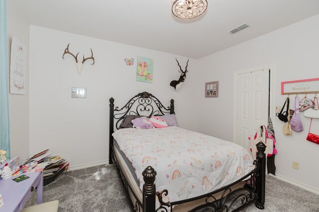 4902 Foxboro Ct, Midland, TX 79705 - bedroom featuring carpet flooring and baseboards
