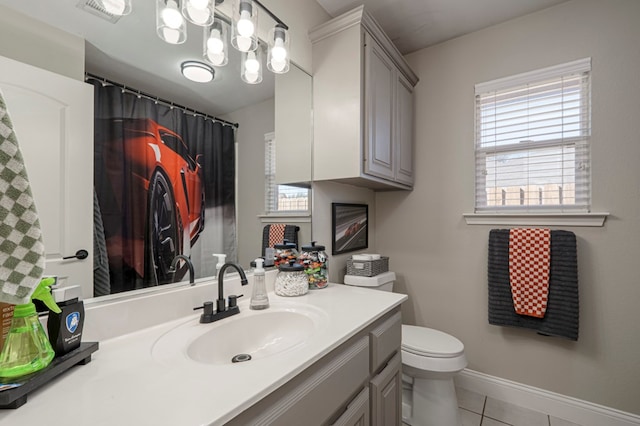 full bathroom featuring baseboards, visible vents, toilet, tile patterned floors, and vanity