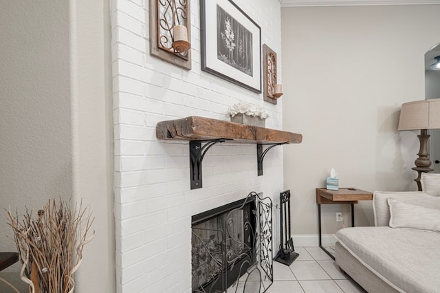 interior space with light tile patterned floors, a fireplace, and baseboards