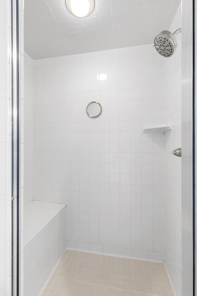 3402 Alicia Ct, Midland, TX 79707 - full bath featuring a tile shower and tile patterned floors