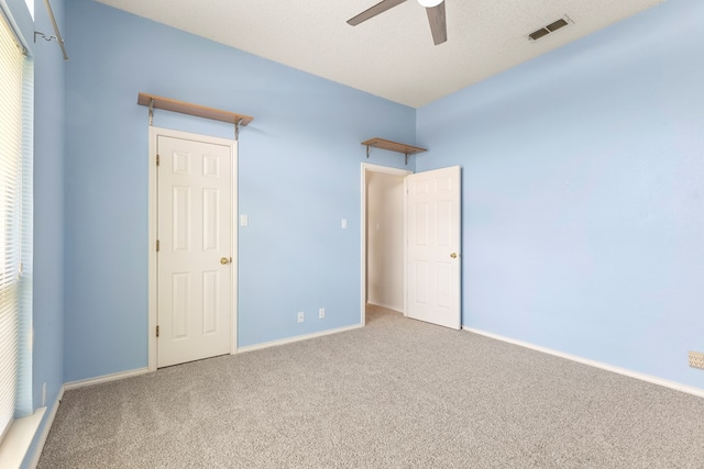 3402 Alicia Ct, Midland, TX 79707 - unfurnished bedroom with carpet flooring and a ceiling fan