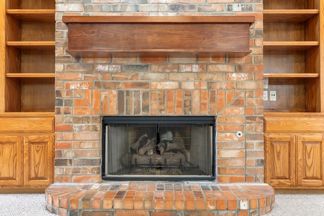 3402 Alicia Ct, Midland, TX 79707 - detailed view of a brick fireplace and carpet