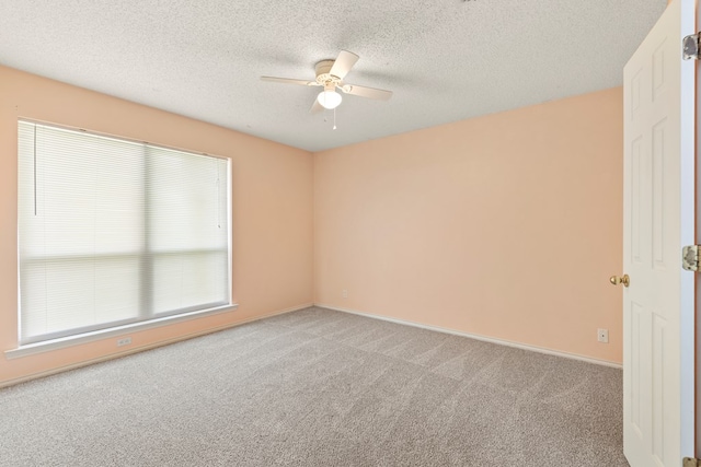 3402 Alicia Ct, Midland, TX 79707 - empty room featuring a ceiling fan, carpet flooring, and a textured ceiling