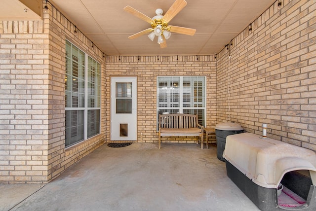 view of patio featuring a ceiling fan