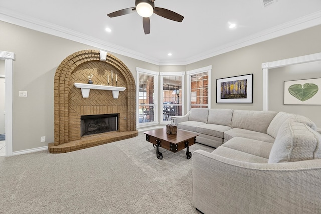 5703 Devlin Pl, Midland, TX 79707 - carpeted living area with ceiling fan, crown molding, a brick fireplace, and recessed lighting
