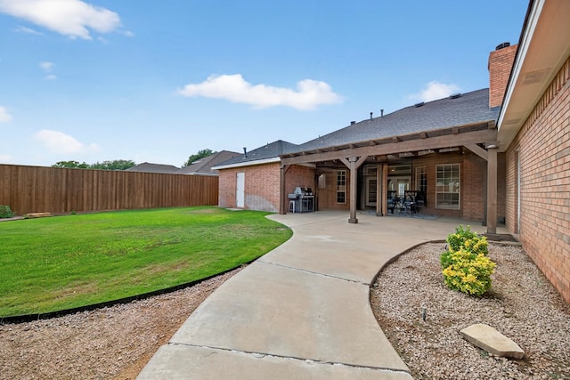 5703 Devlin Pl, Midland, TX 79707 - fenced backyard with a patio