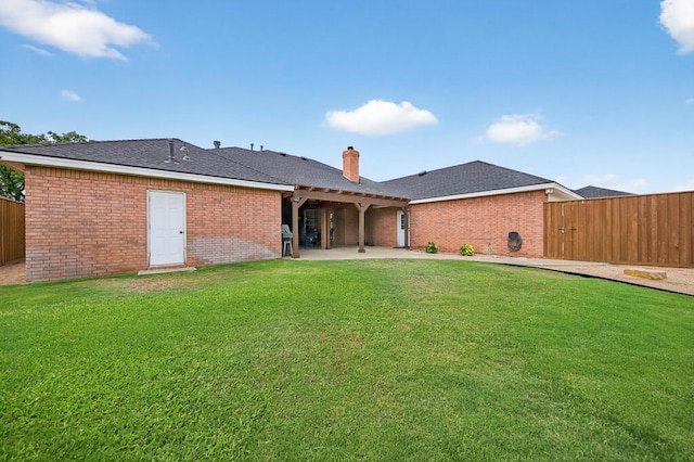 5703 Devlin Pl, Midland, TX 79707 - rear view of house with a patio area, brick siding, a chimney, and a pergola