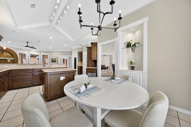 5703 Devlin Pl, Midland, TX 79707 - dining area featuring vaulted ceiling, a ceiling fan, light tile patterned flooring, a chandelier, and recessed lighting