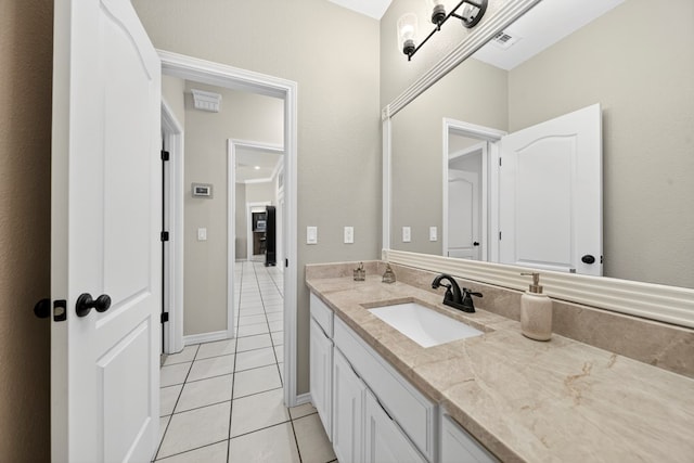 5703 Devlin Pl, Midland, TX 79707 - bathroom with vanity and tile patterned floors