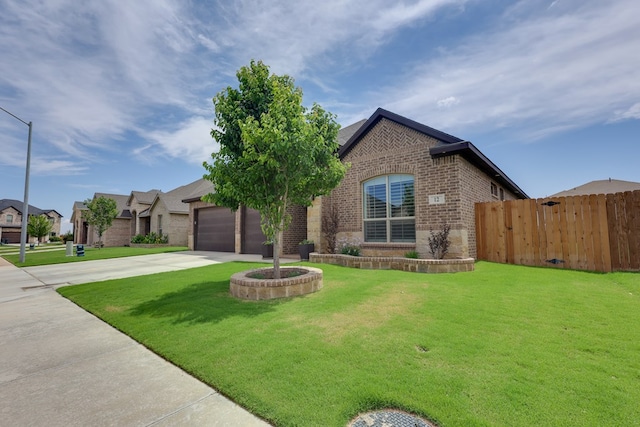 view of front of house with brick siding and concrete driveway