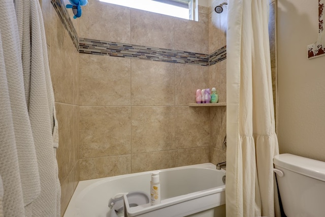 full bathroom with shower / tub combo and toilet