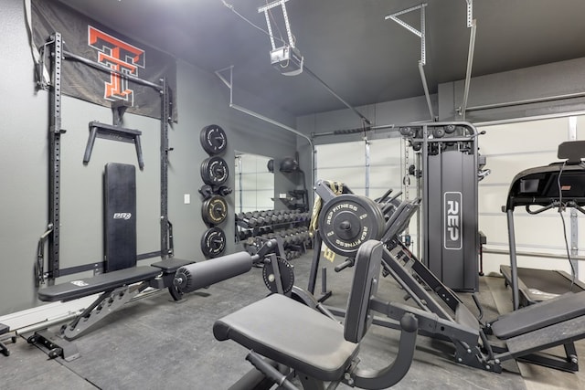 workout area with a garage