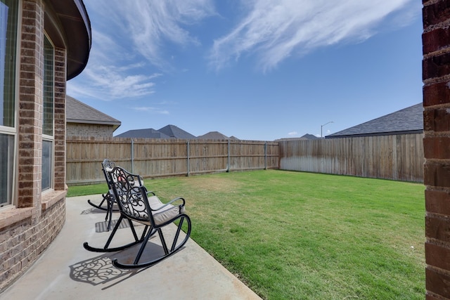 view of yard with a patio area