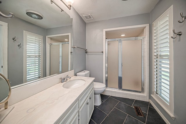 bathroom featuring walk in shower, plenty of natural light, and tile patterned flooring