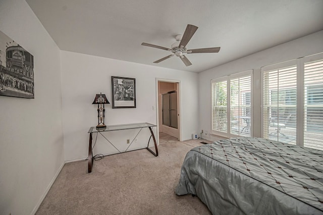 bedroom with light colored carpet and ceiling fan