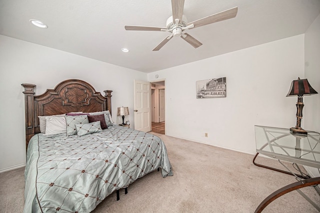 carpeted bedroom featuring ceiling fan