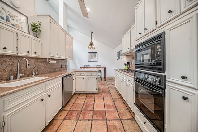 kitchen featuring decorative backsplash, sink, black appliances, decorative light fixtures, and lofted ceiling