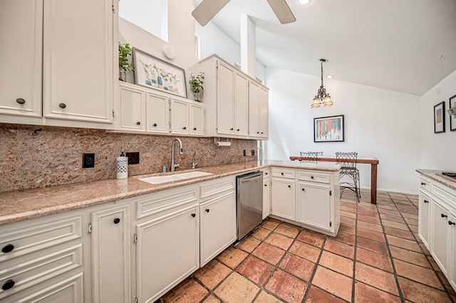 kitchen with sink, hanging light fixtures, stainless steel dishwasher, kitchen peninsula, and decorative backsplash