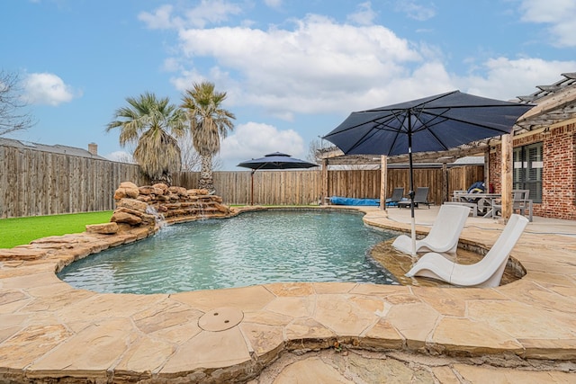 view of pool featuring a patio and pool water feature