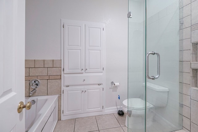 bathroom with separate shower and tub, tile patterned flooring, and toilet