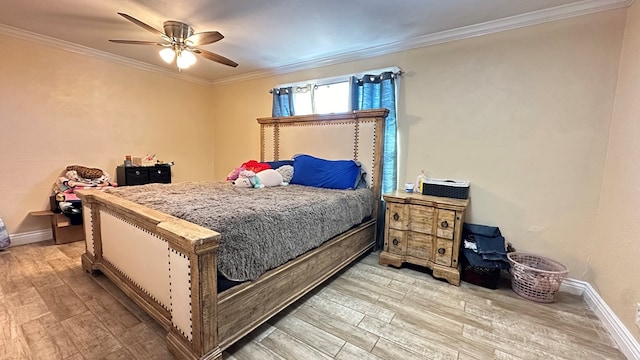 bedroom featuring ceiling fan, crown molding, and hardwood / wood-style flooring