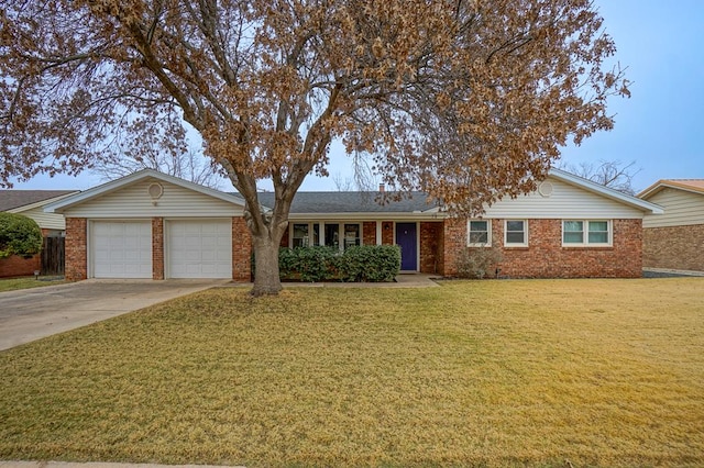 ranch-style home with a garage and a front lawn