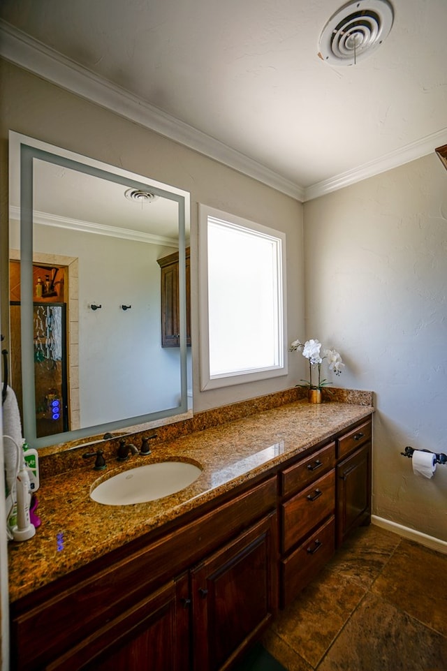 bathroom featuring vanity and ornamental molding