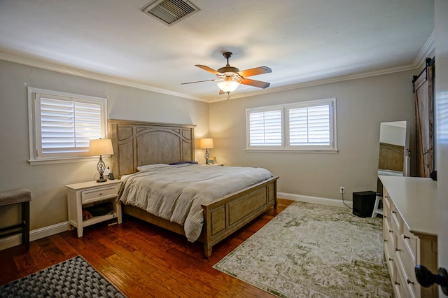 bedroom featuring ceiling fan, dark hardwood / wood-style flooring, and crown molding