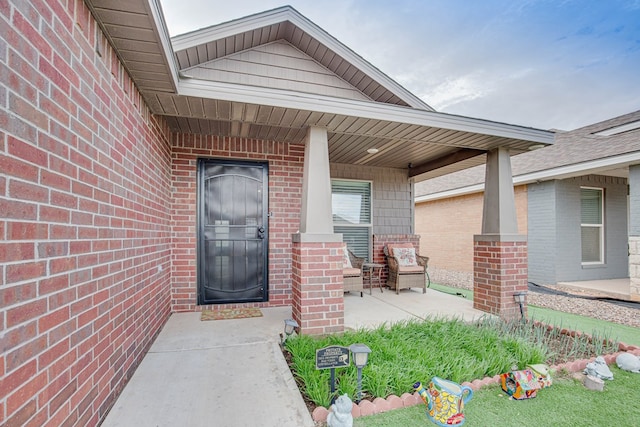 307 Pioneer Cir, Midland, TX 79705 - view of exterior entry with brick siding and a porch