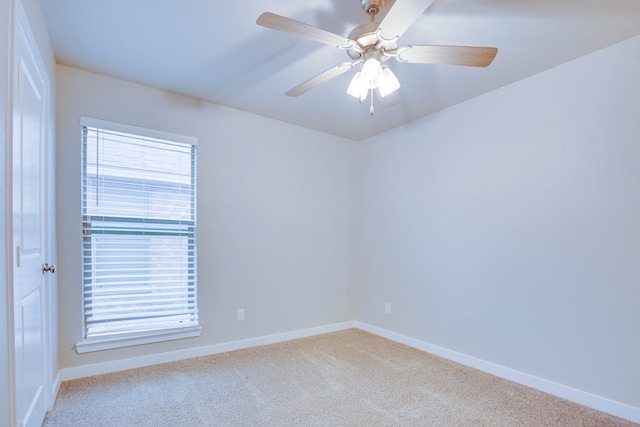 307 Pioneer Cir, Midland, TX 79705 - carpeted empty room with baseboards and ceiling fan