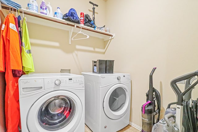 washroom with washer and clothes dryer