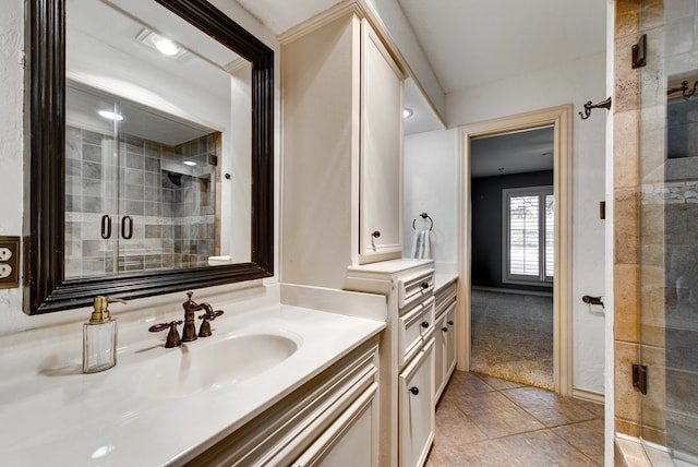 bathroom with vanity and walk in shower